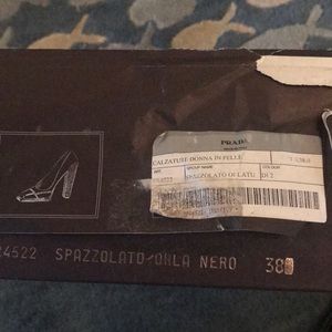 Prada heels.. black with white details